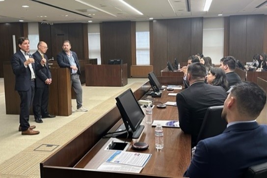 Hon. Clark S. Cheney, Vu Bui, and Benjamin Richards speak to IPLI students on June 5, 2025.