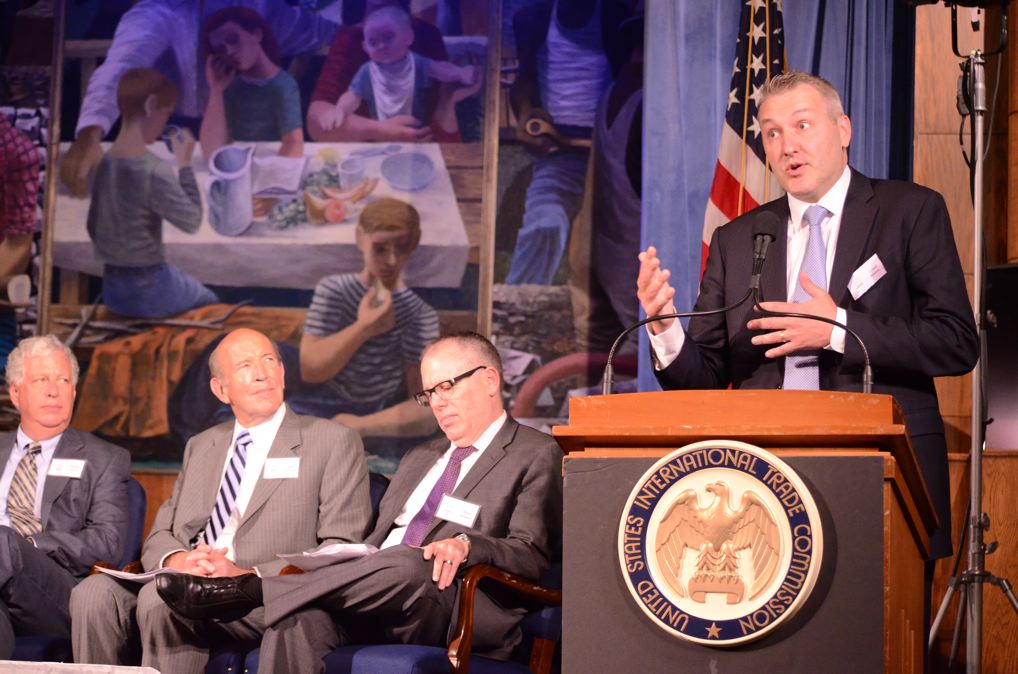 Chad Bown of the Peterson Institute , providing commentary on 'Import Injury Proceedings'. Shown with, from right to left, Commissioner Dean Pinkert, Lynn Featherstone, and James Lyons.