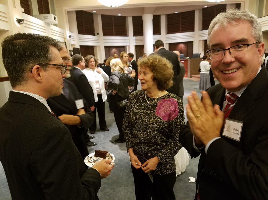 Kevin Rosenbaum (USITC Alum), Robin Turner (USITC), and Michael Robbins (USITC) enjoying themselves at the Centennial reception.  