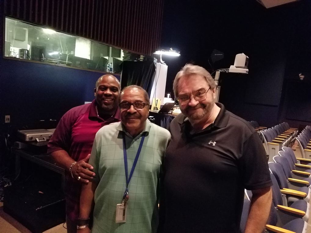 The USITC technical crew prepare the Voice of America auditorium for the Centennial Conference. Shown from left to right are Keith Johnson, Tyrone Coward, and Gary Waldock. 