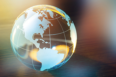 Stylized graphic of a globe with a gradient background